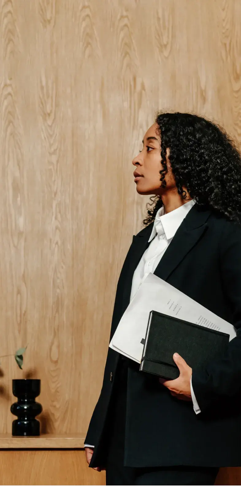 Paralegal professional holding legal documents