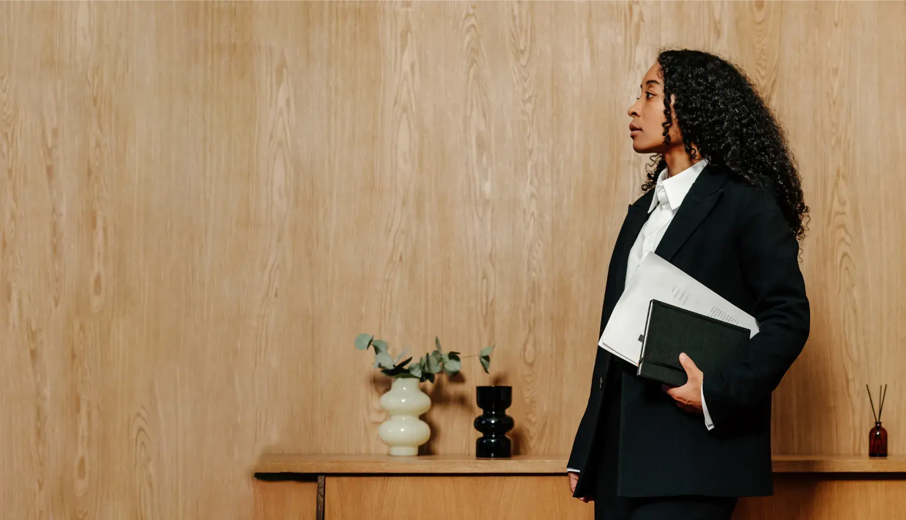 Paralegal professional holding legal documents